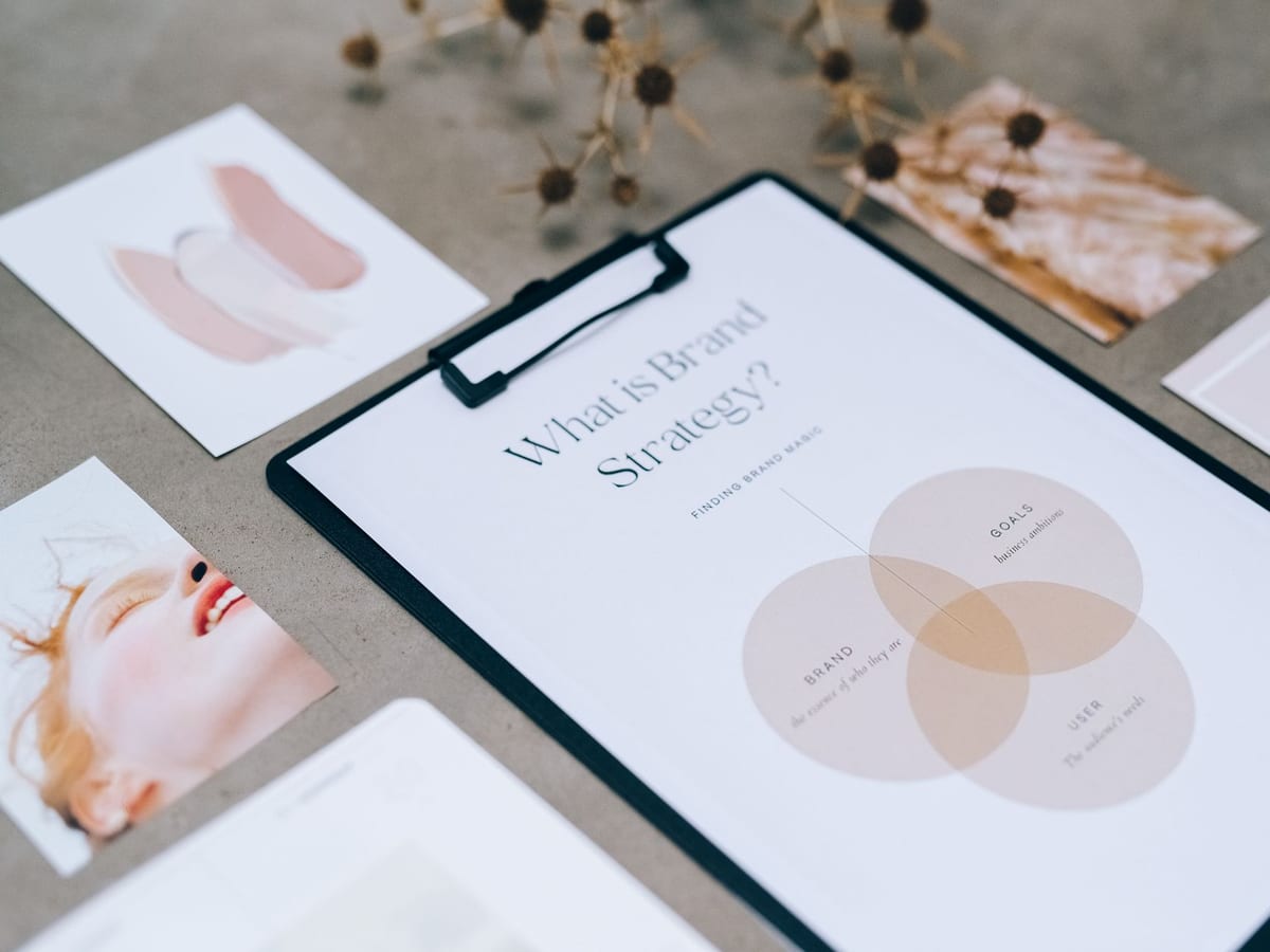 A designer working on a brand layout